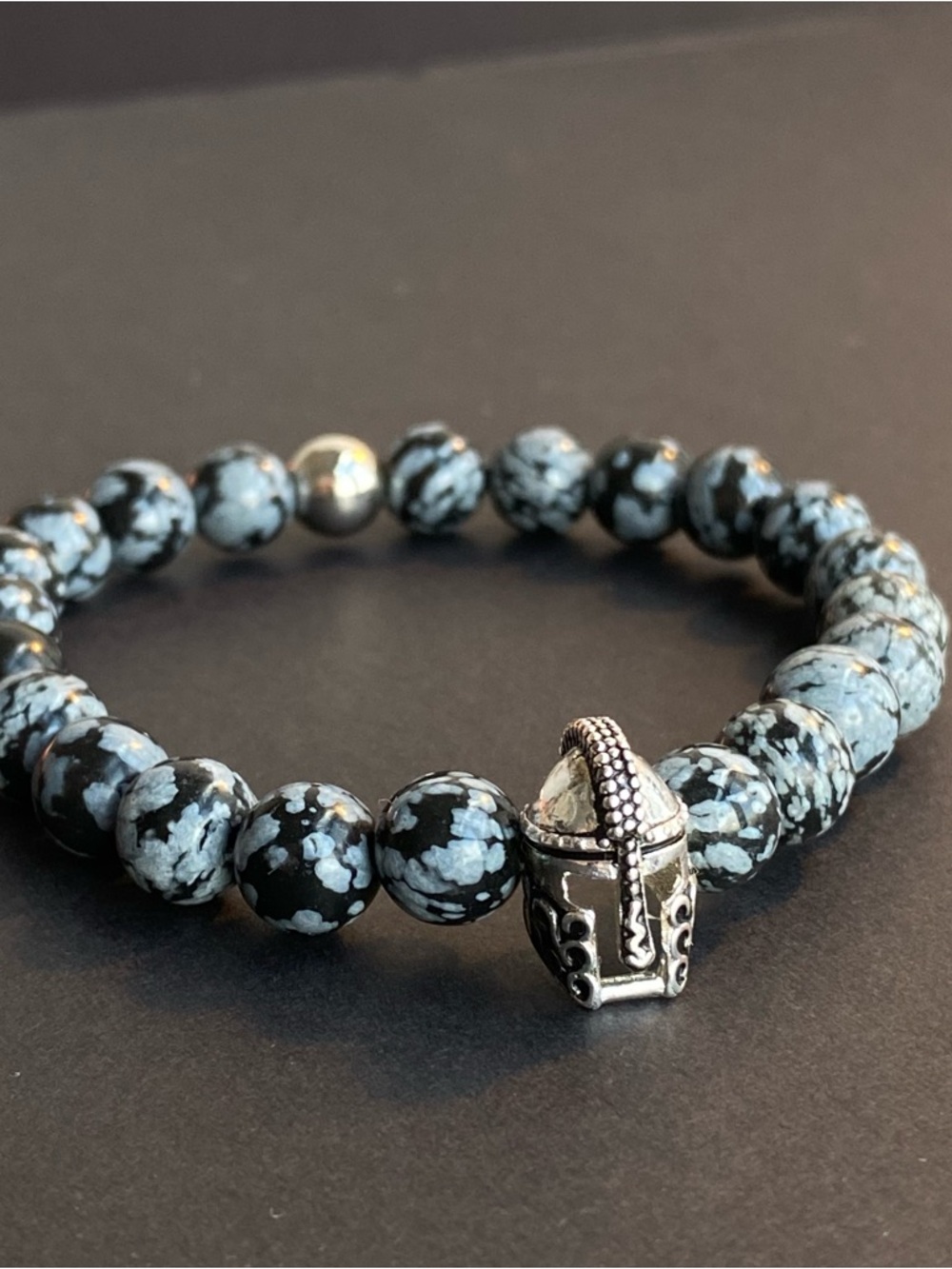 Snowflake Obsidian Bead Bracelet with Silver Helmet Charm